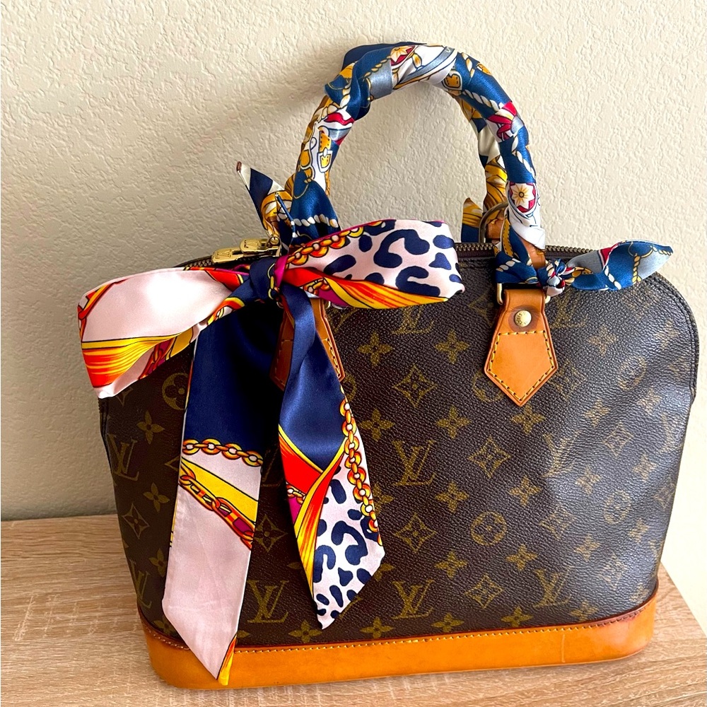 Louis Vuitton Alma PM Monogram Handbag